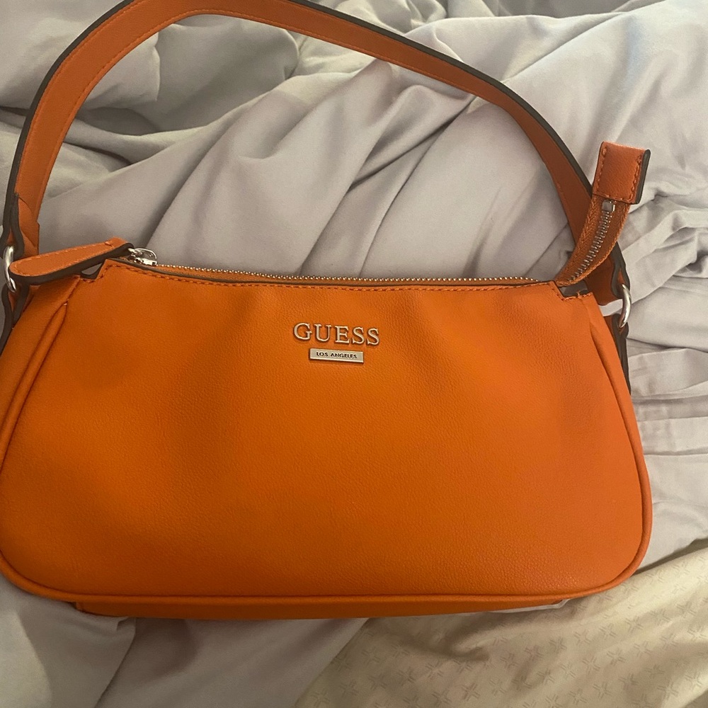 Small Guess purse. Only worn once.